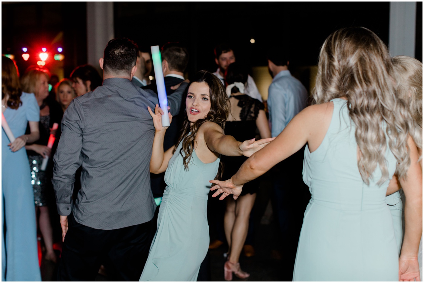 wedding guests dance at the reception