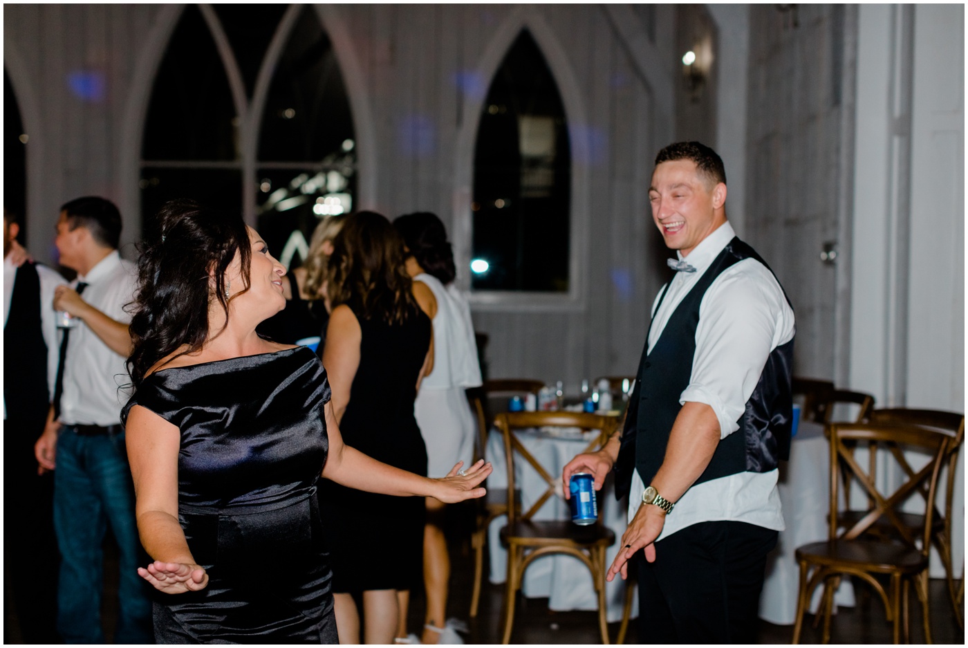 mother and son dance together