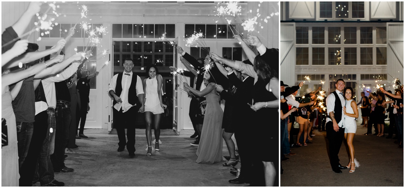 bride and groom have grand exit with sparklers