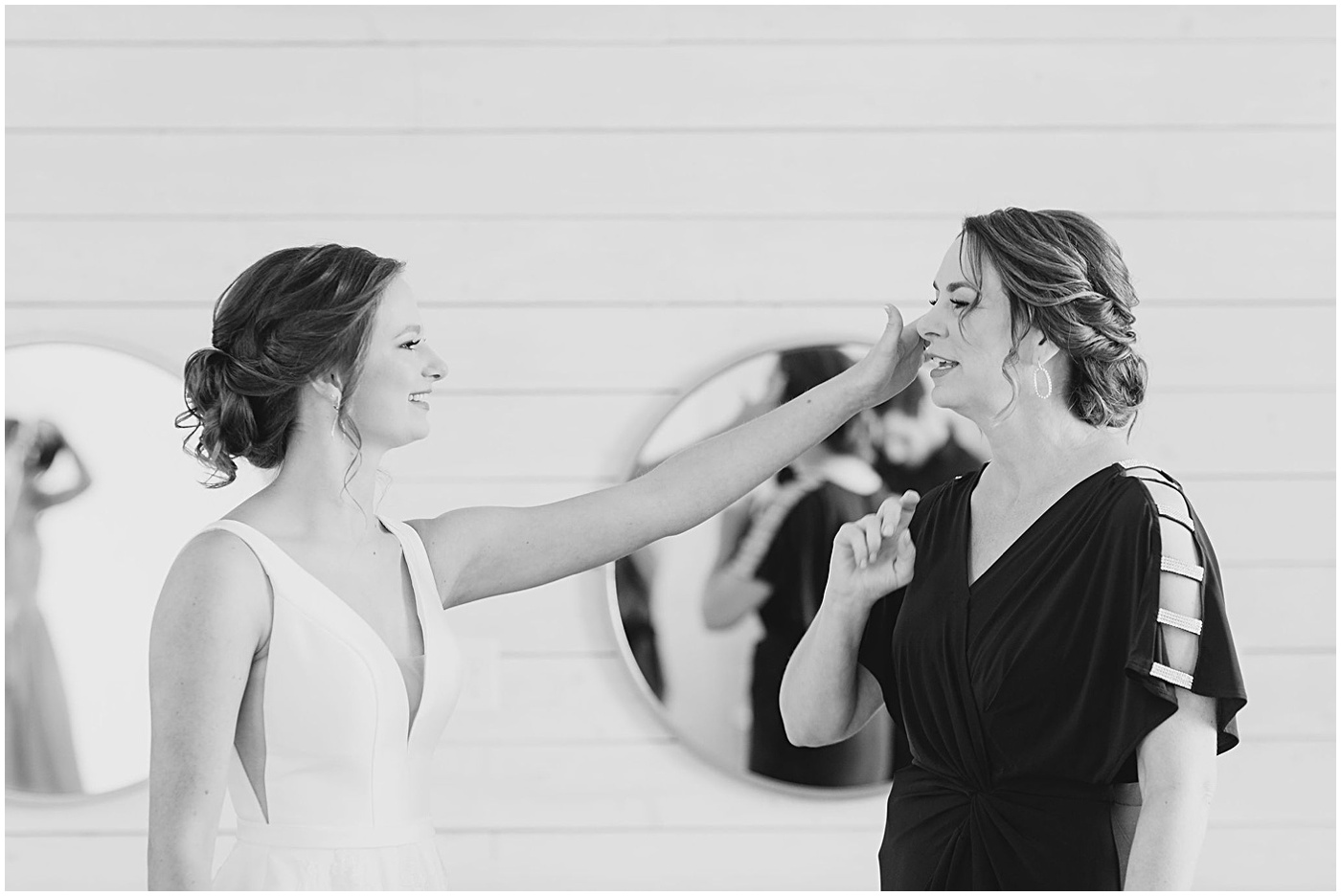 Texas wedding photographer captures bride wiping her mom's tears
