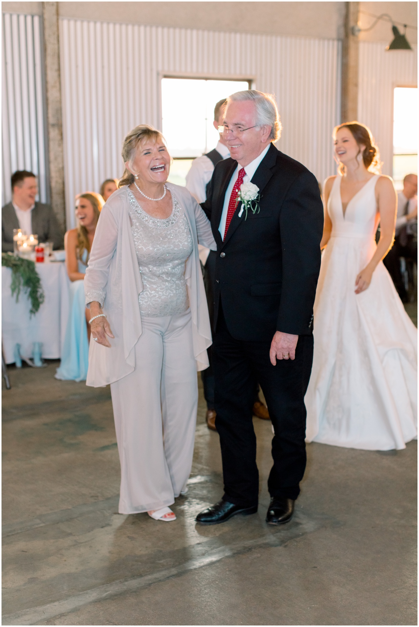 grandparents laughing at a Texas wedding