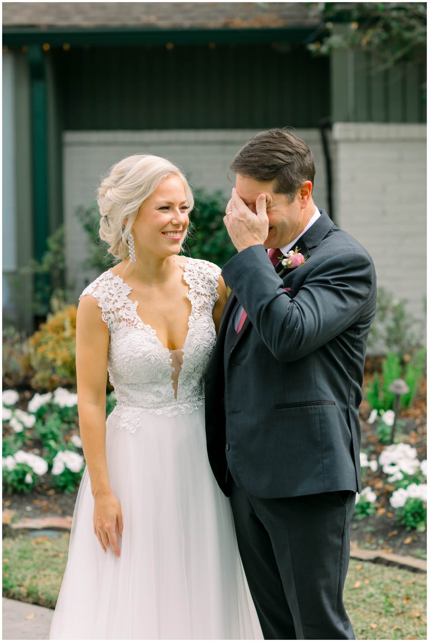 a father cries as he sees his daughter for the first time on their wedding day 