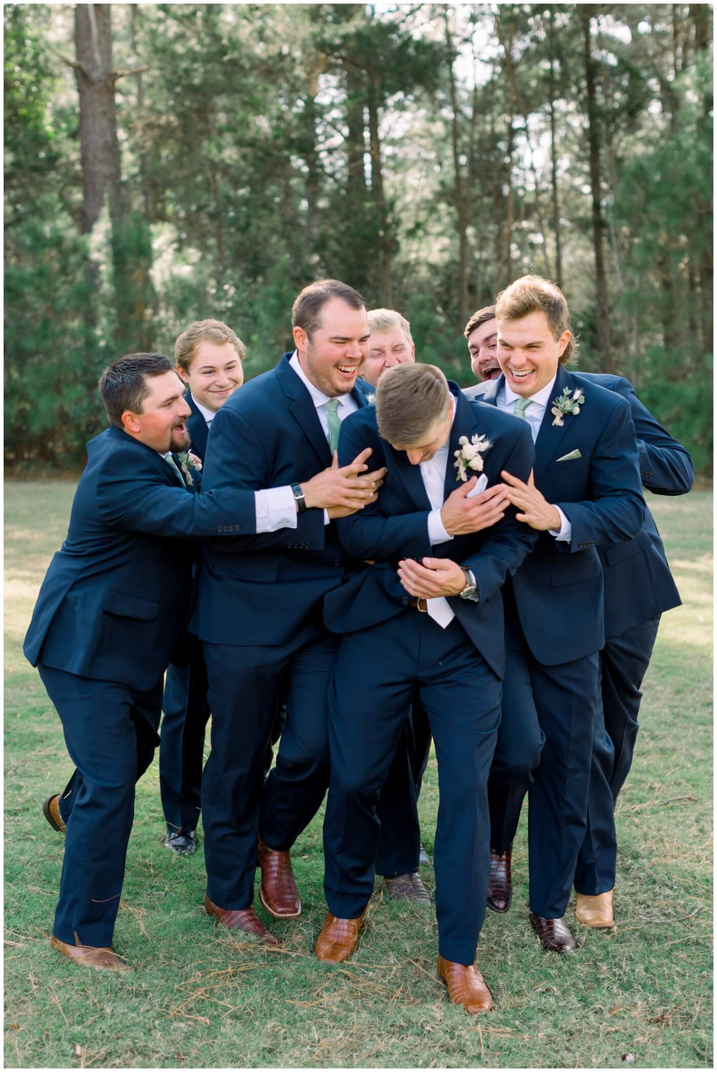 Houston Wedding at The Vine | the groom laughing with his groomsmen