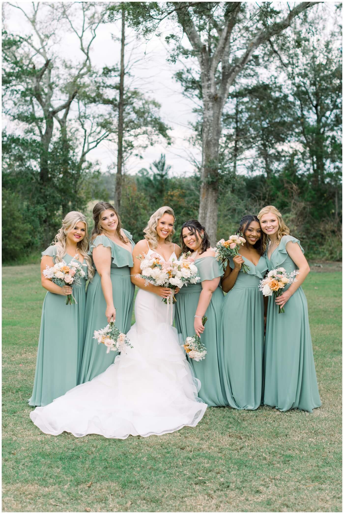 Houston Wedding at The Vine | the bride smiling with her bridesmaids