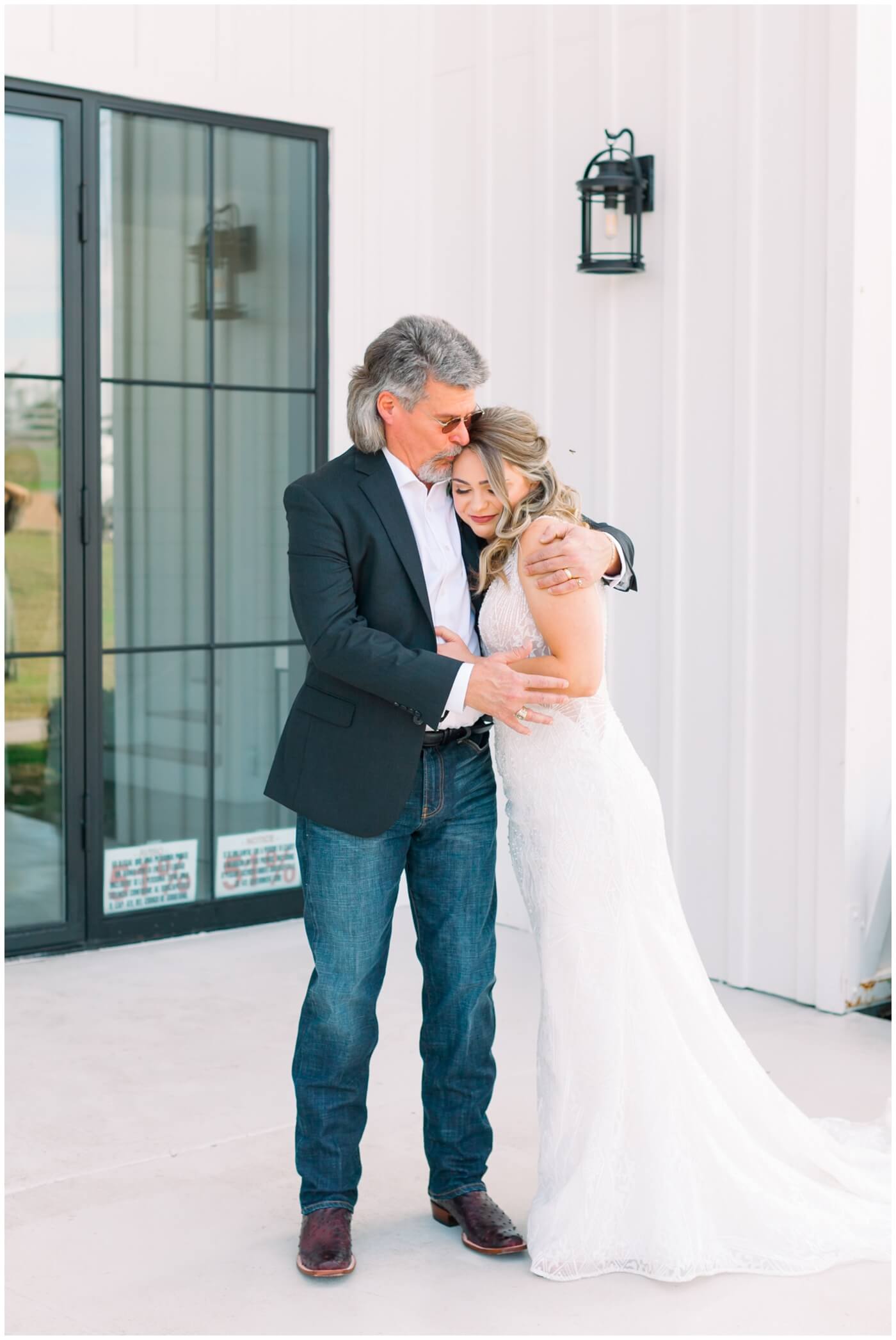 Texas farmhouse wedding | father hugs his daughter when he sees her for the first time