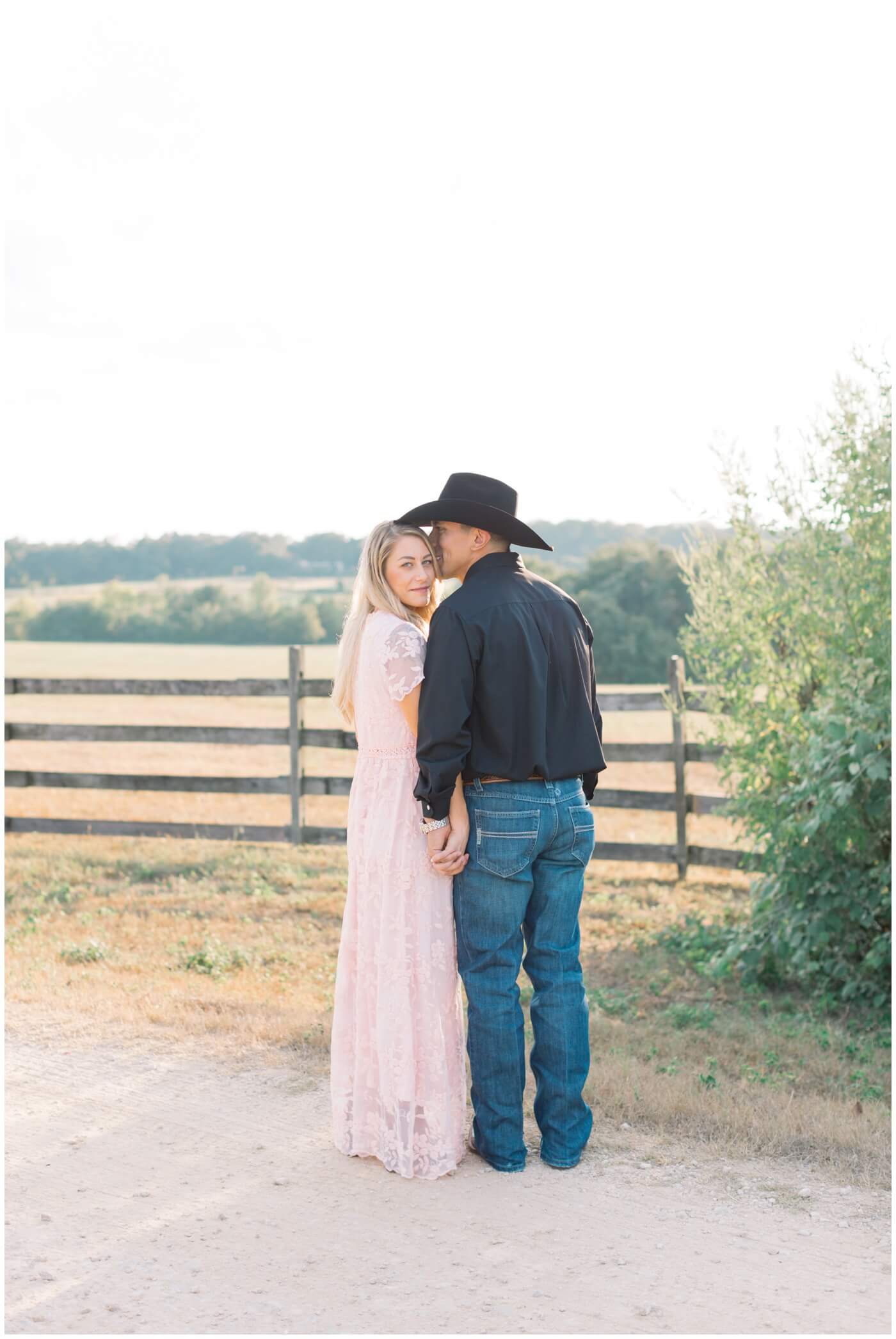 A country couple sweetly stands together during their Engagement photos in Houston. 
