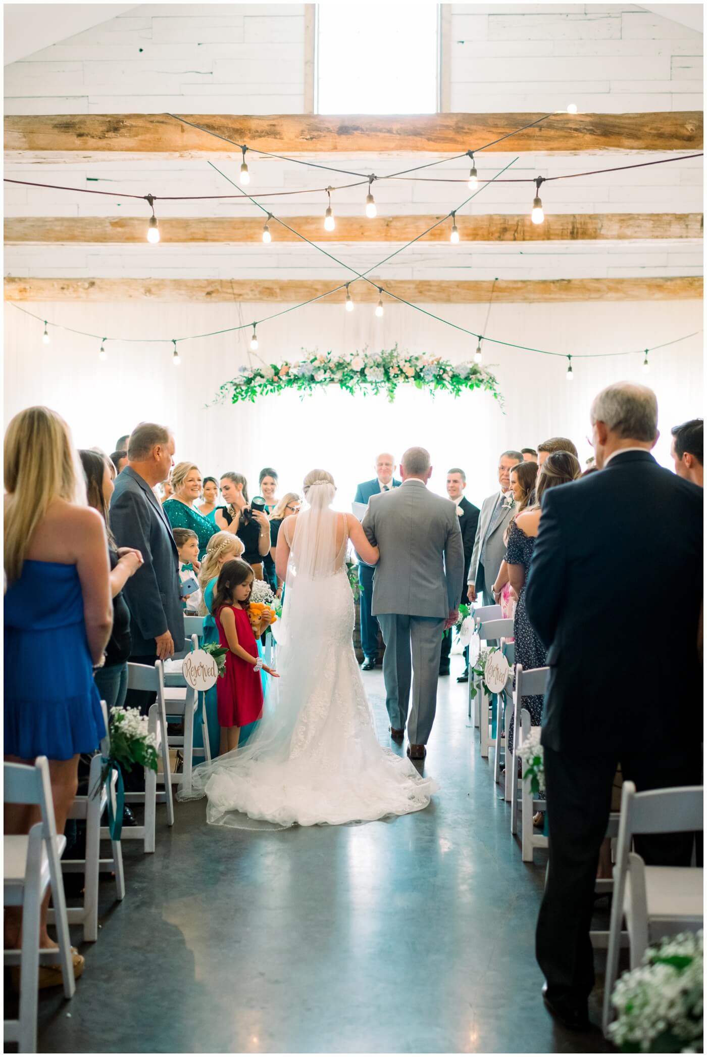 Beckendorff Farms | The bride walks down the aisle with her father 
