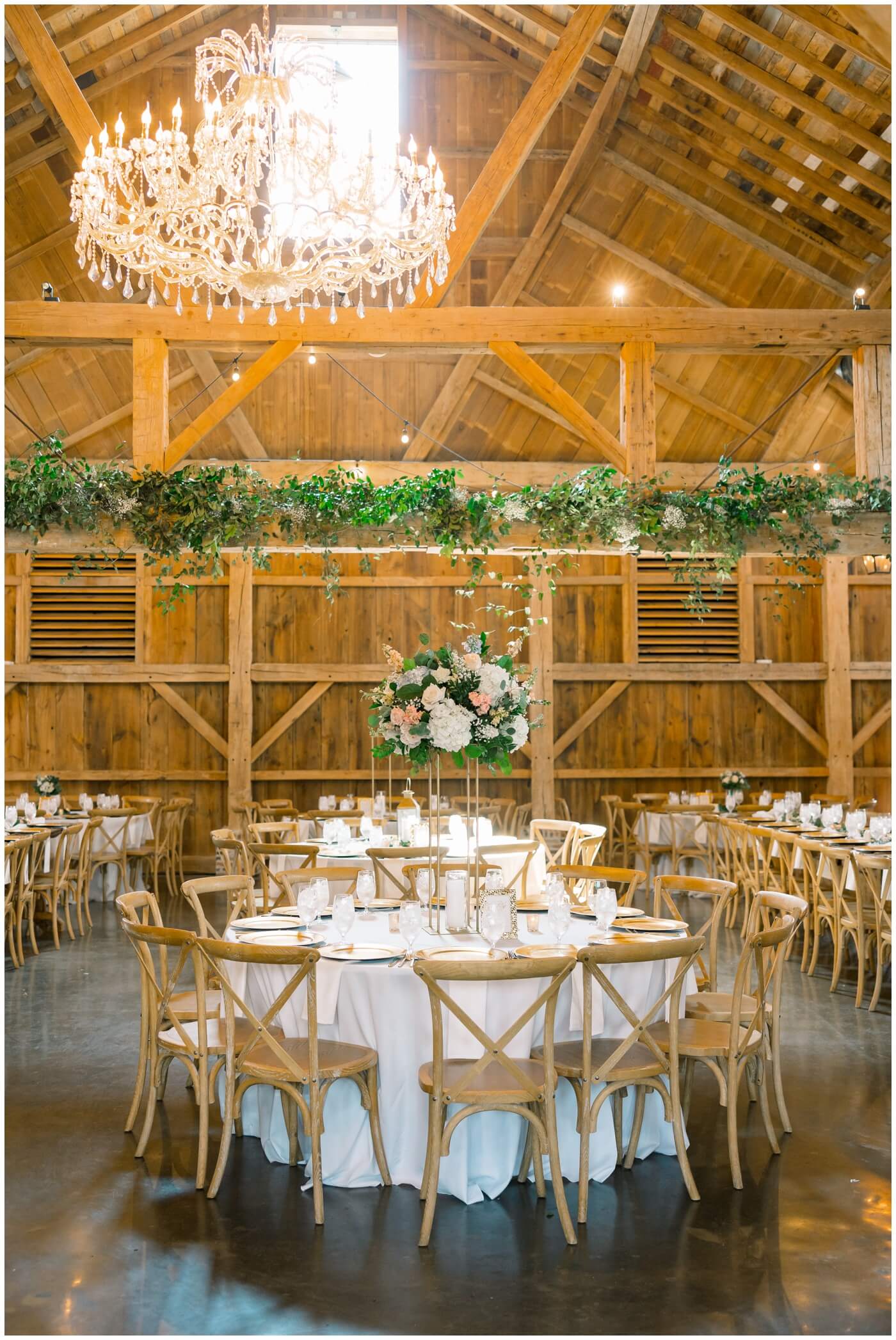 Beckendorff Farms | The reception space is beautifully prepared with flowers and greenery