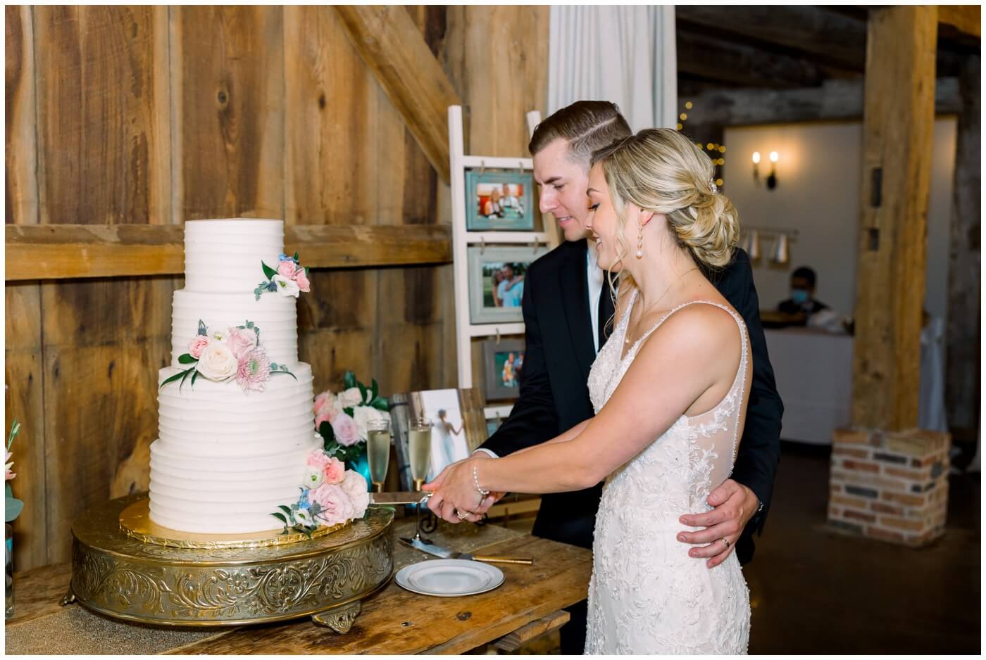 The couple cut their cake on their wedding day