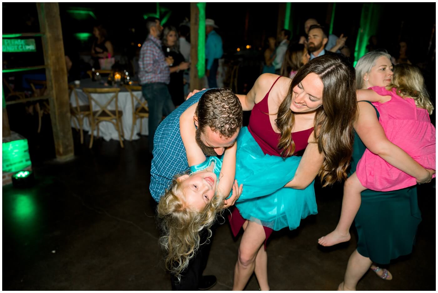 Guests dance excitedly during the reception