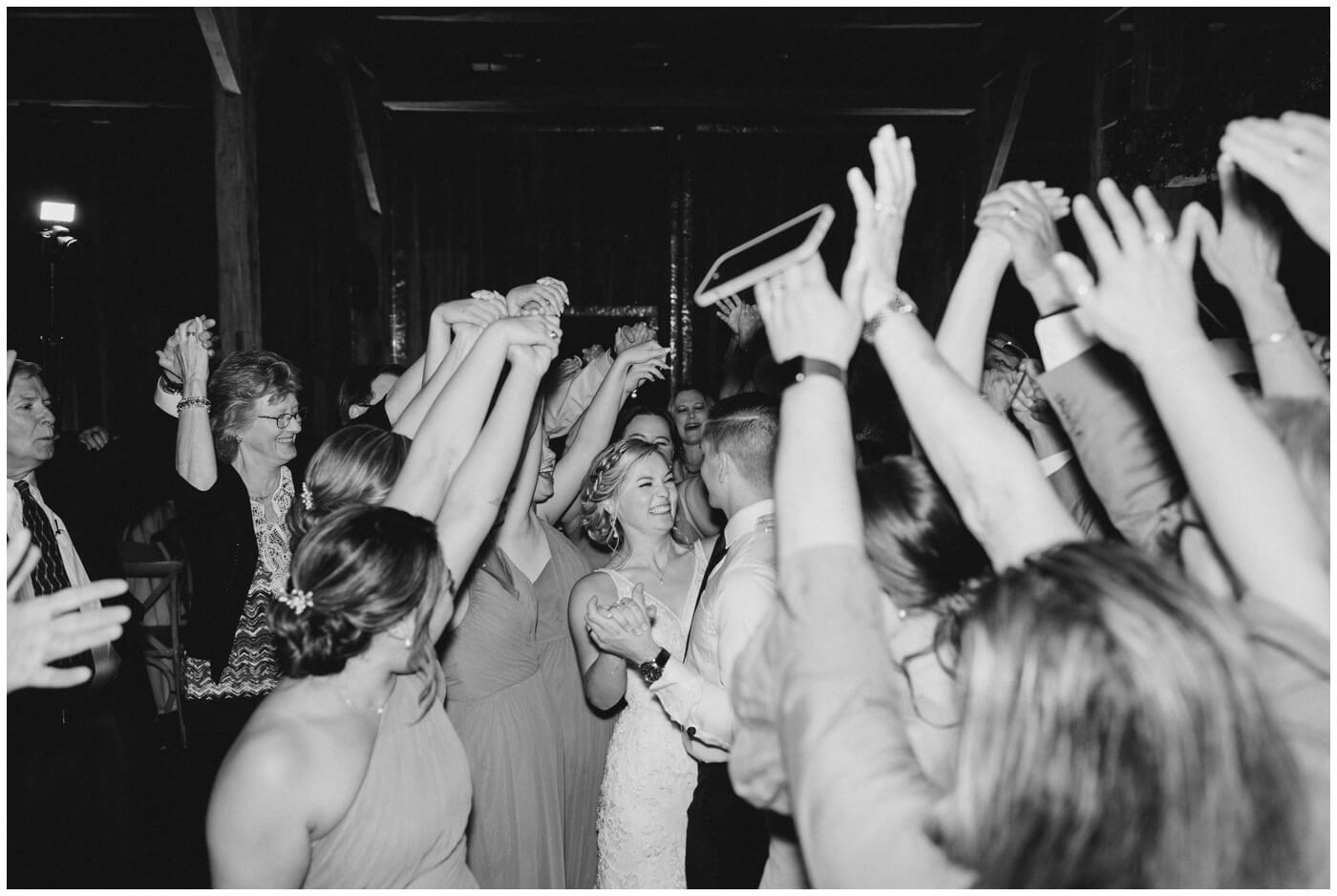 Guests dance excitedly during the reception