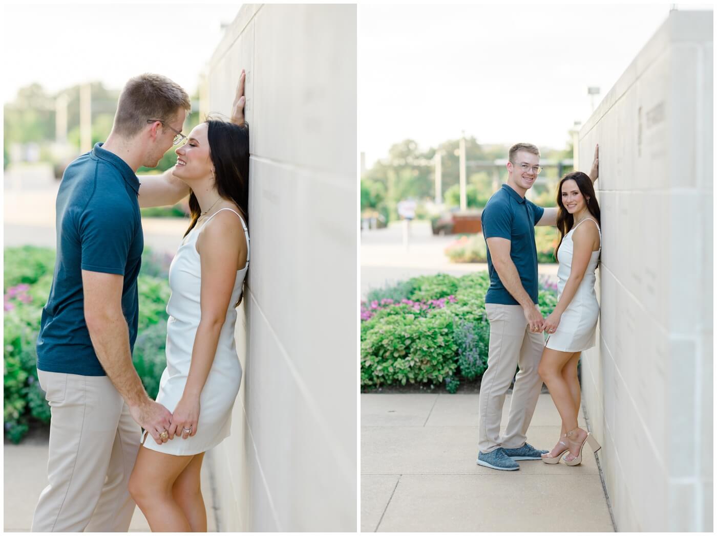 A couple smiles during their engagement session at the TAMU Gardens.