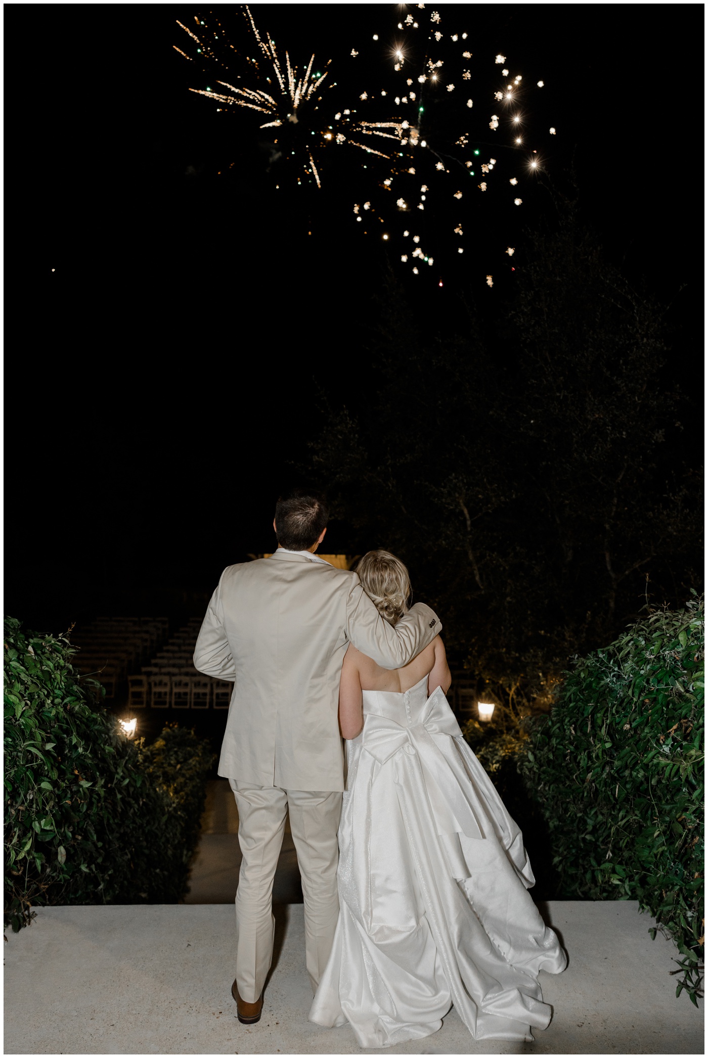 A firework show surprises the bride and groom