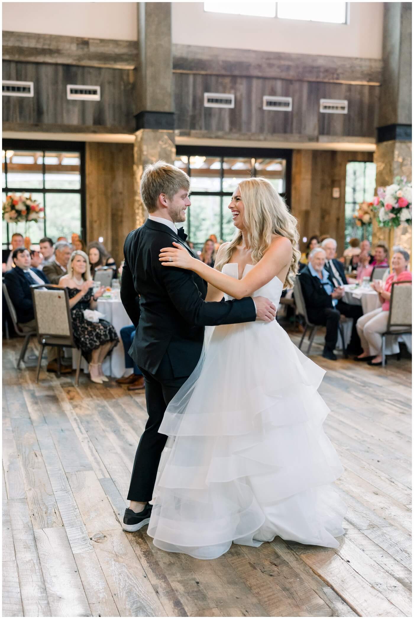 The bride and groom share their first dance as husband and wife