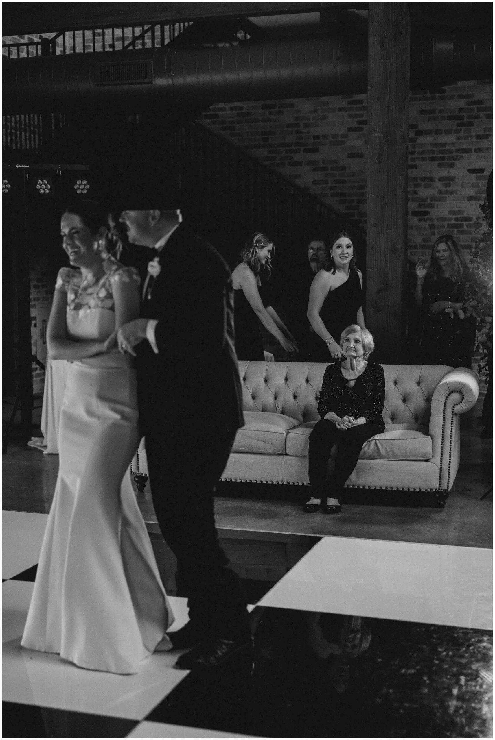 bride and groom share a first dance at the weinberg