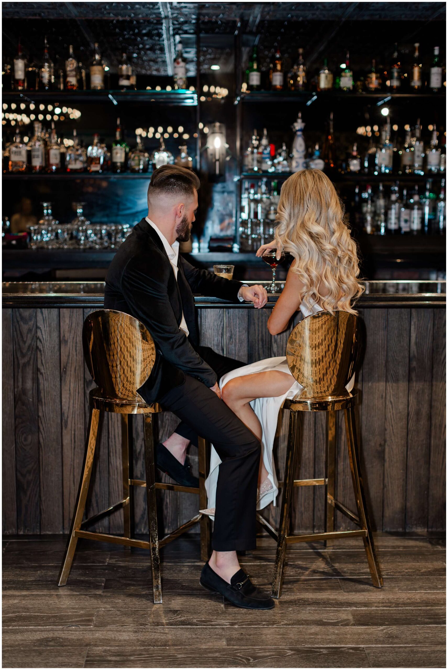 Classy engagement photos at a bar in houston