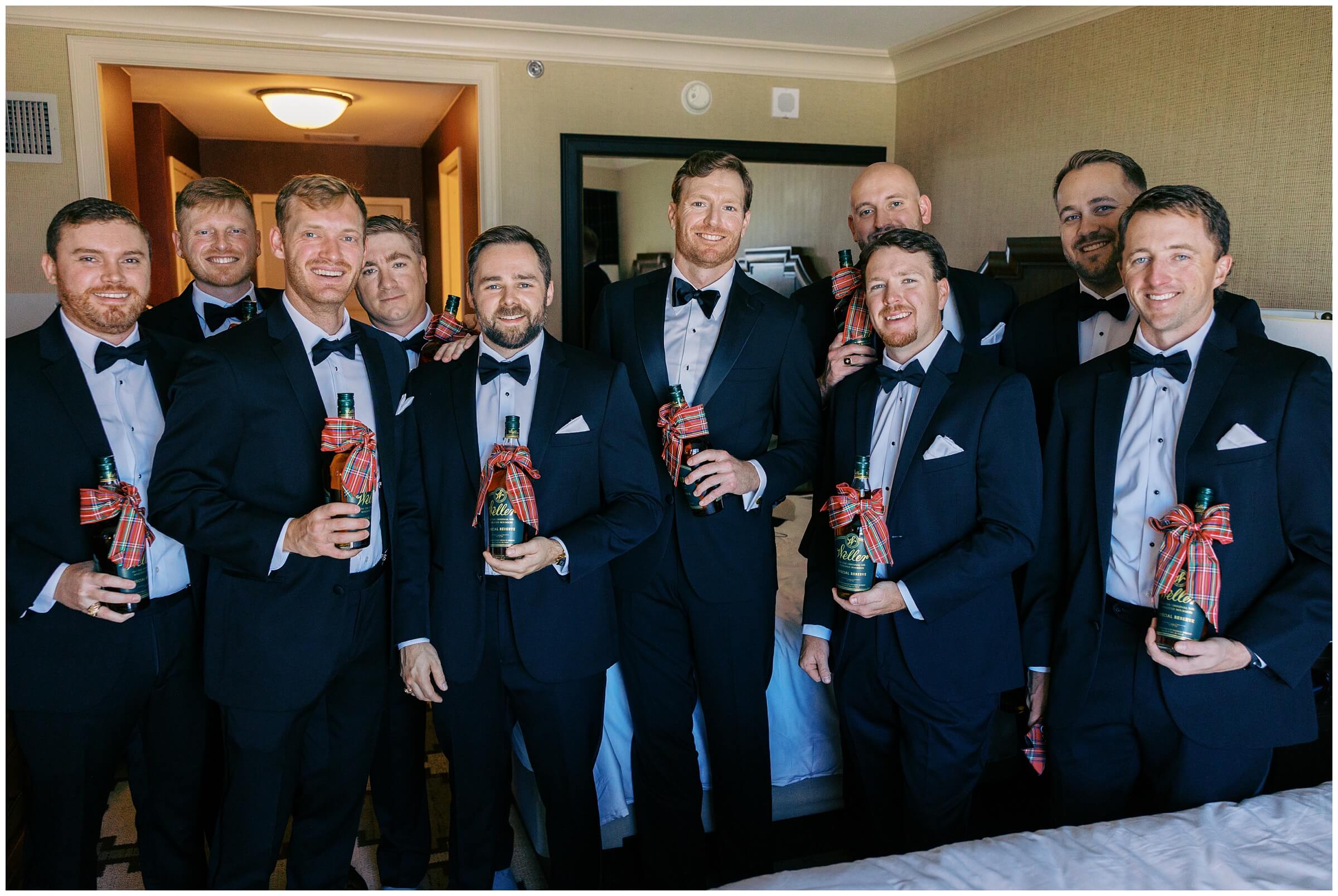 Groom and groomsmen getting ready | Dallas Wedding Photographer