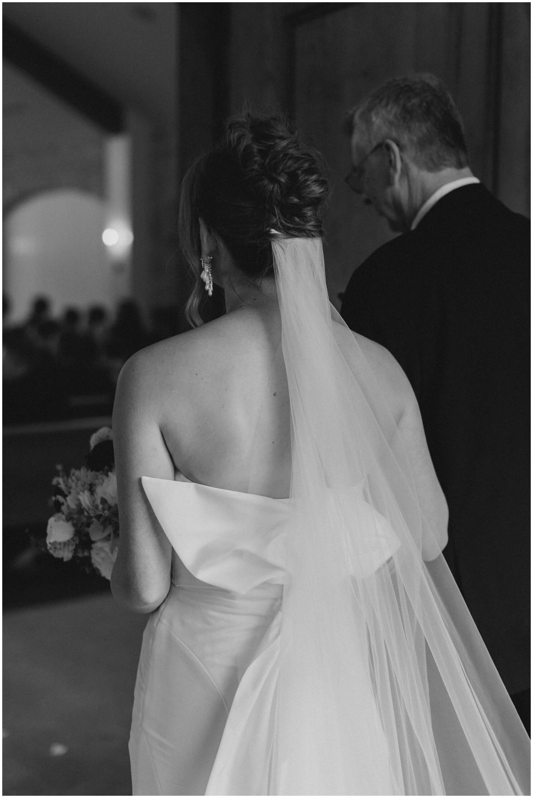 Ceremony at The Blue Magnolia featuring colorful florals by Rose and Rae.