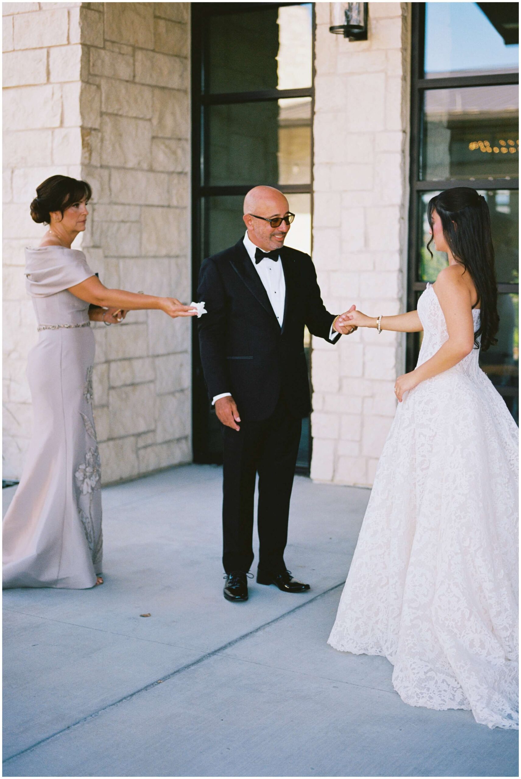 A bride and her father on her wedding day at the omni barton creek