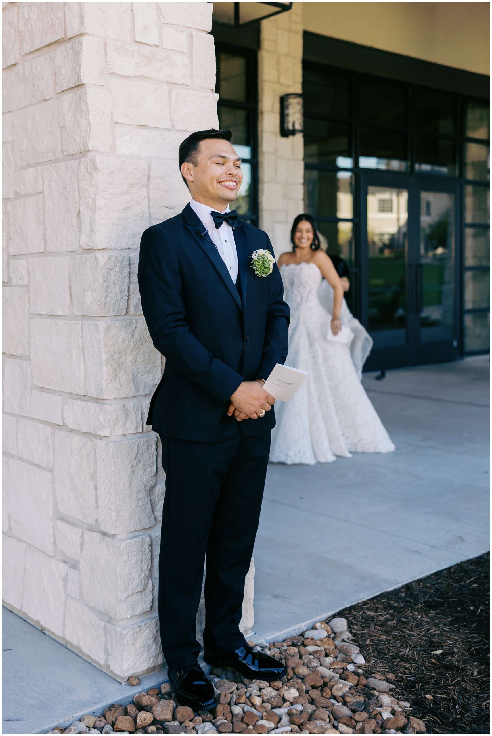 a bride and groom share a first touch and private vows at the omni barton creek