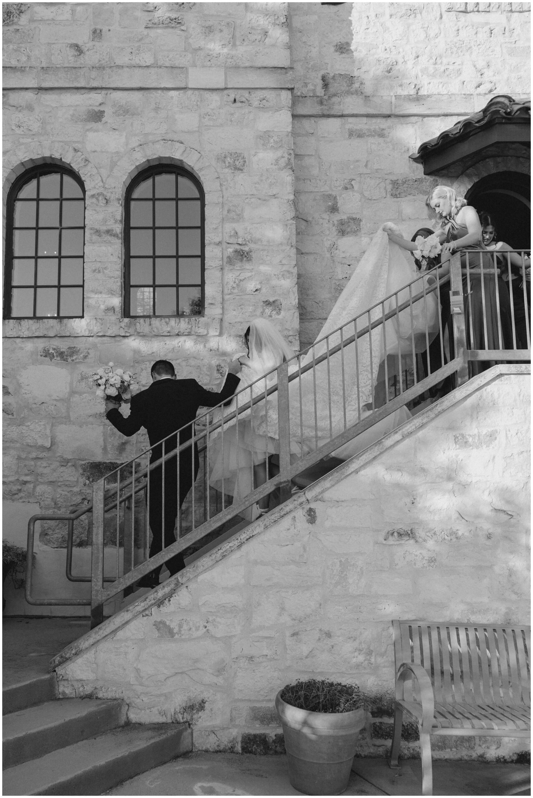 A bride and groom celebrate with their wedding party in Austin, Texas