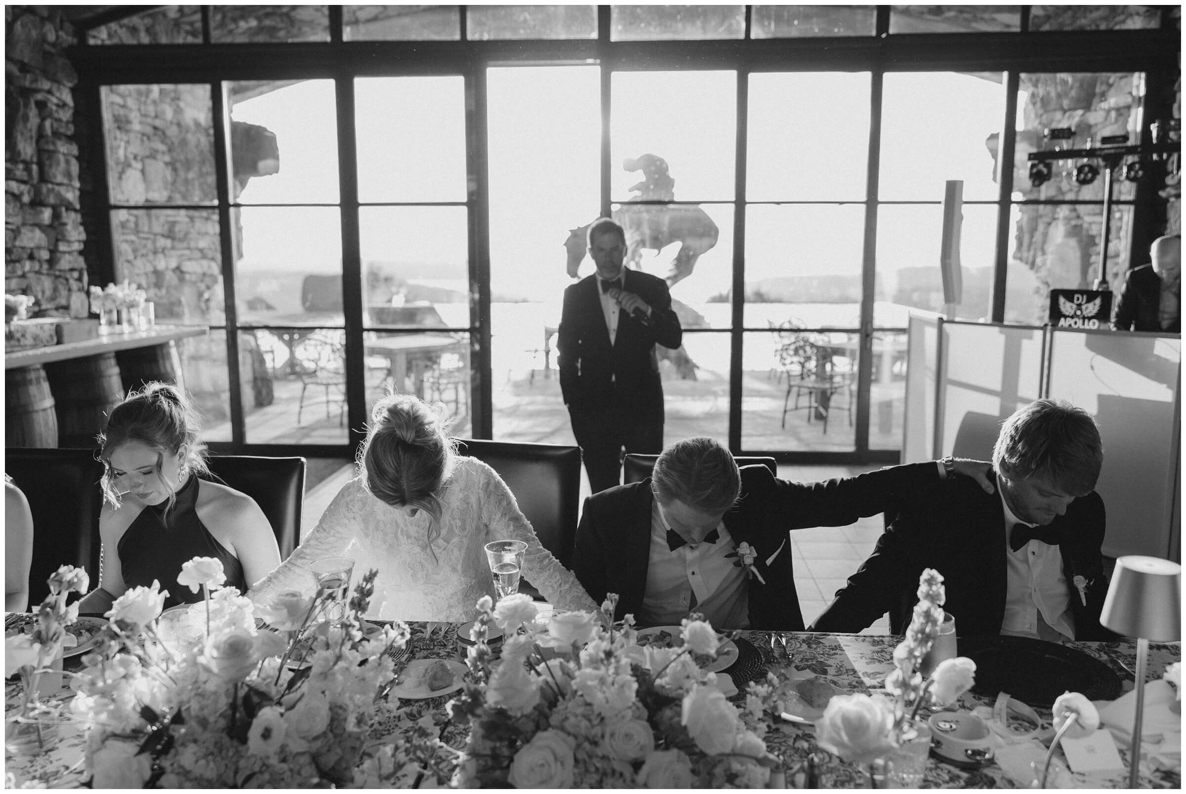 Destination Wedding photographer | Guests celebrating the couple at the wedding reception at the wine cellar of top of the rock
