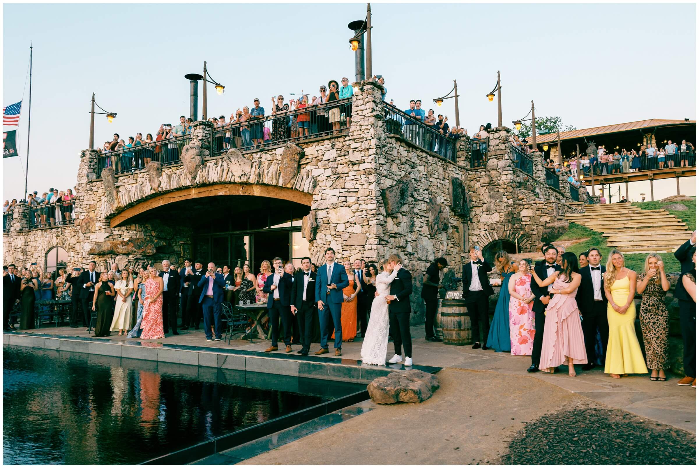 Destination Wedding photographer | Guests celebrating the couple at the wedding reception at the wine cellar of top of the rock