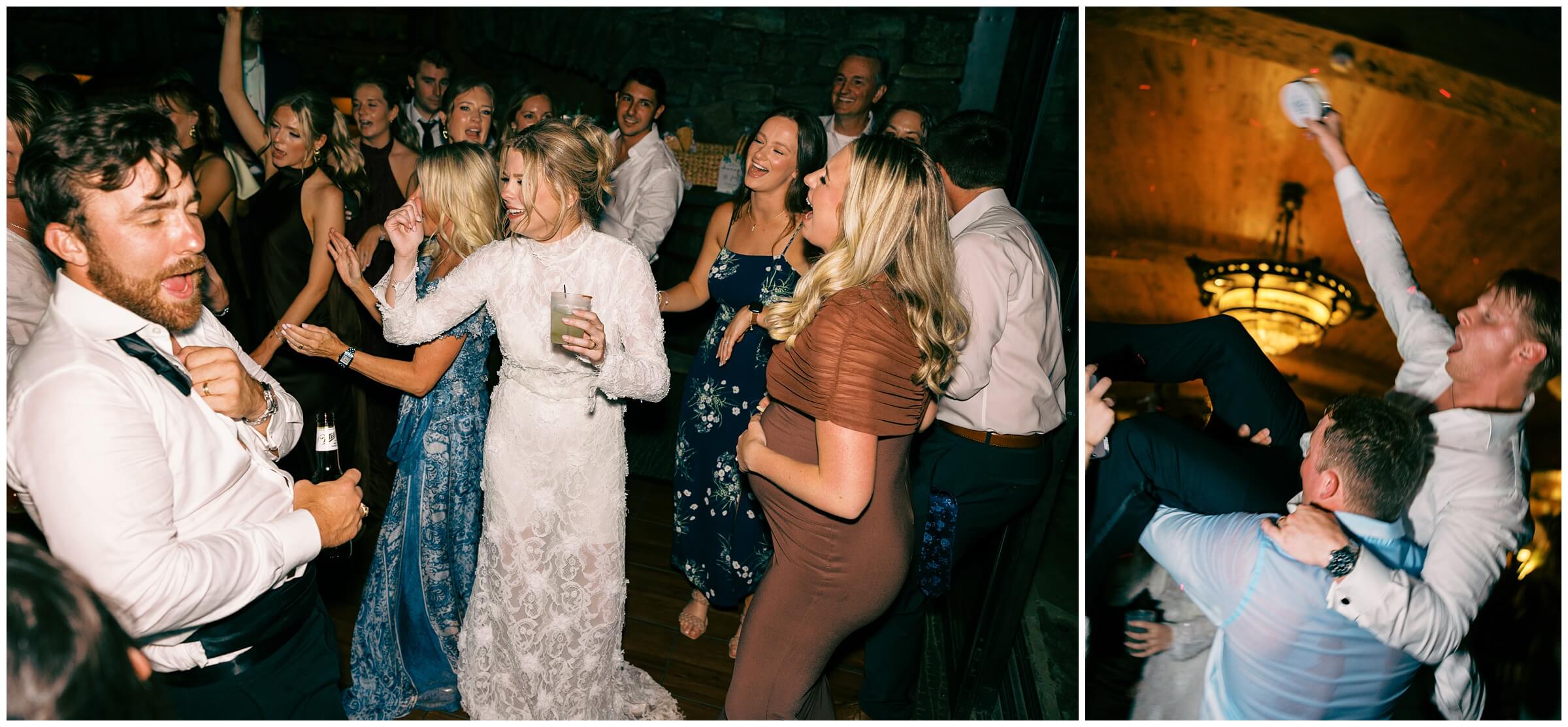 Destination Wedding photographer | Guests celebrating the couple at the wedding reception at the wine cellar of top of the rock